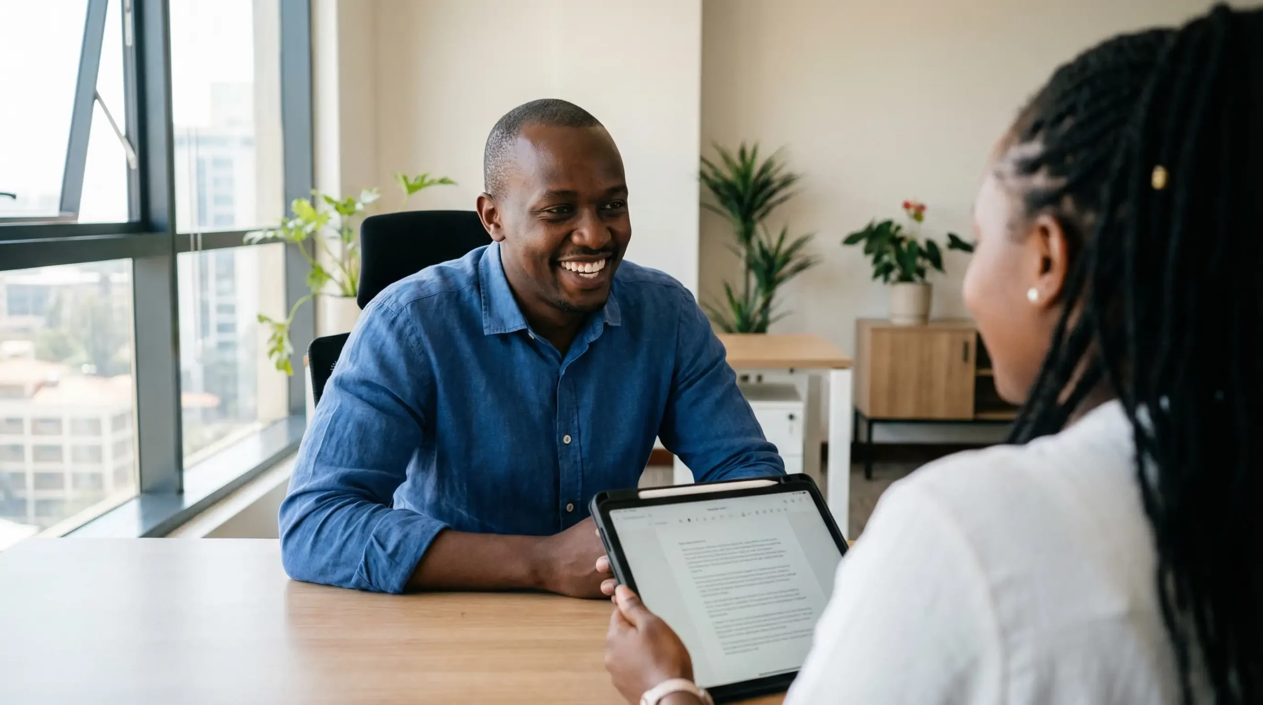 Nairobi property manager and landlord reviewing a property management agreement together